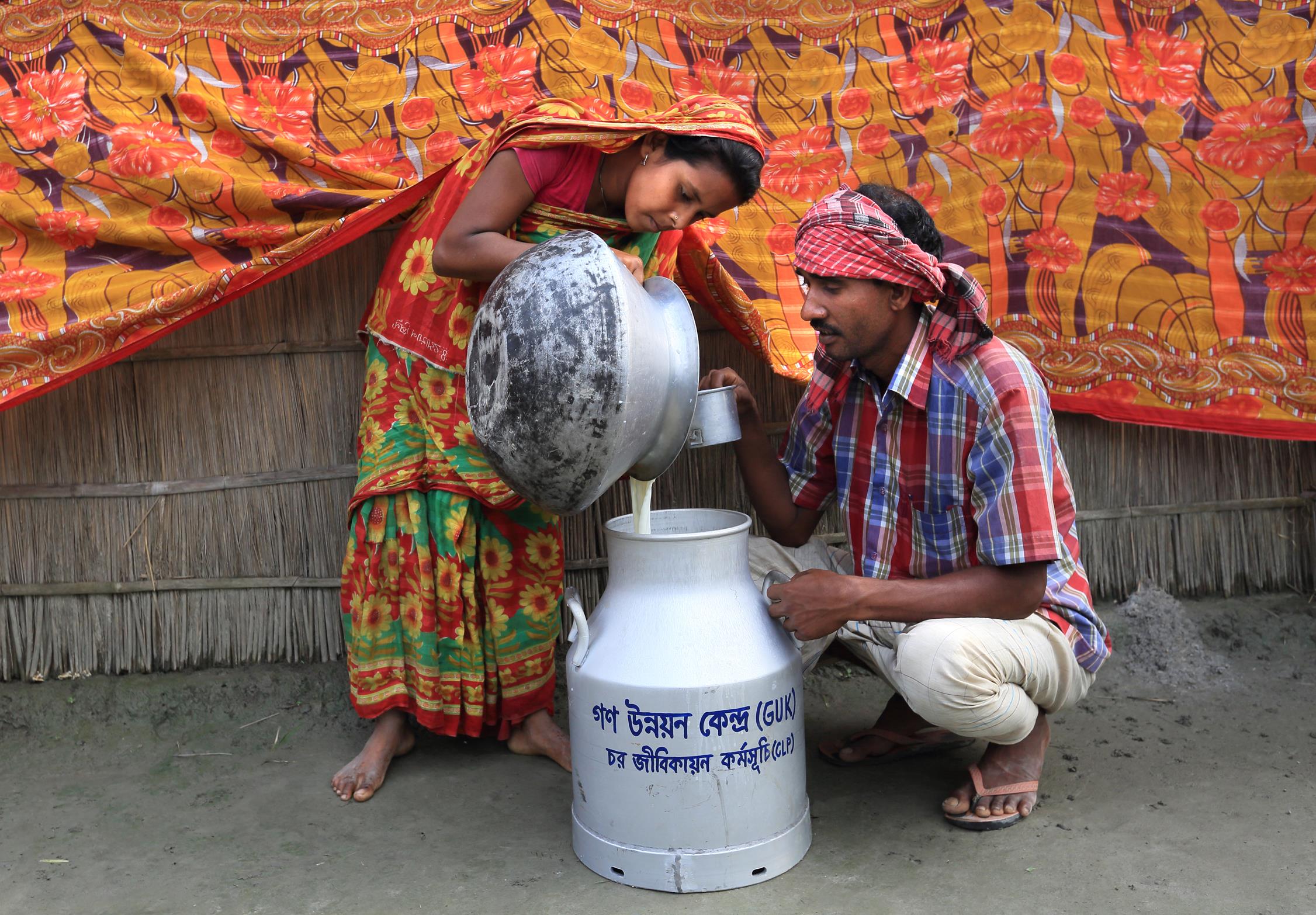 Participant selling milk to the Goala