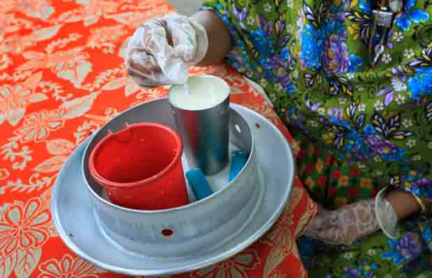 Goala testing amount of fat before collecting it